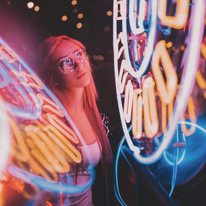 Fire House Neon Signs | Girl looking at a neon business sign. Neon sign reflected in window